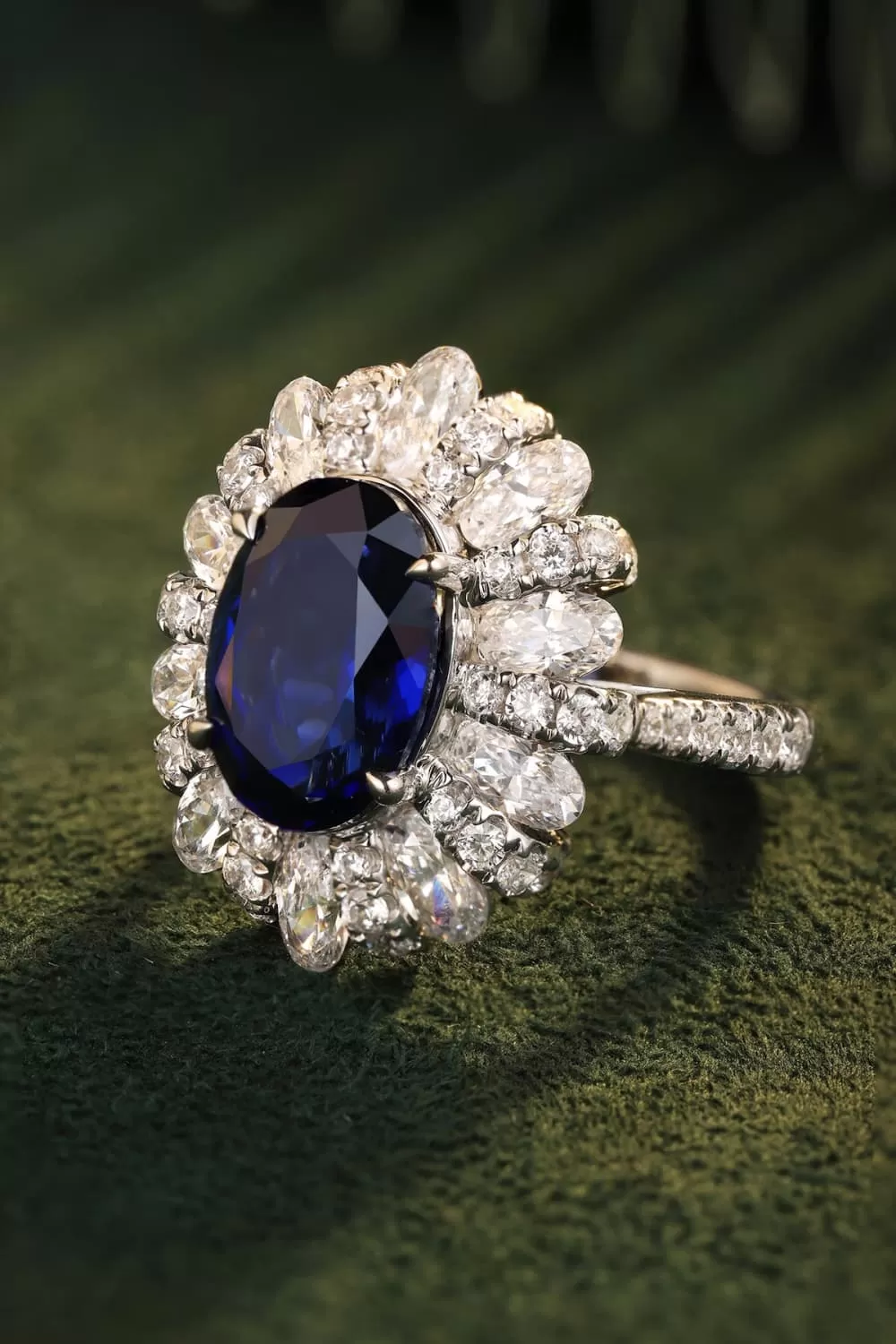 Oval Sapphire in Flower Shape CZ Ring