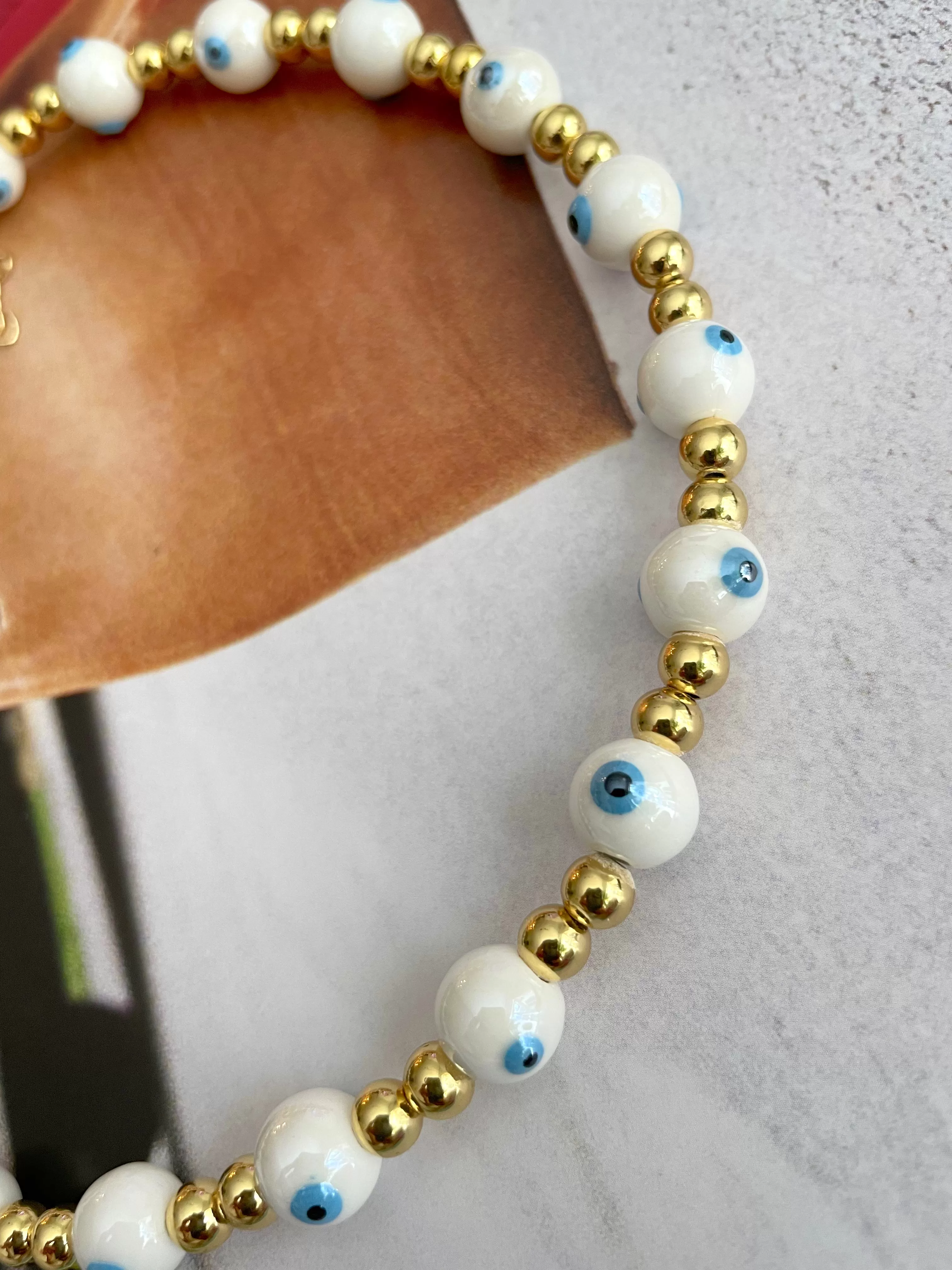 Round Evil Eye gold beaded necklace